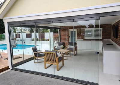 image of alfresco enclosure with frameless glass bifold doors