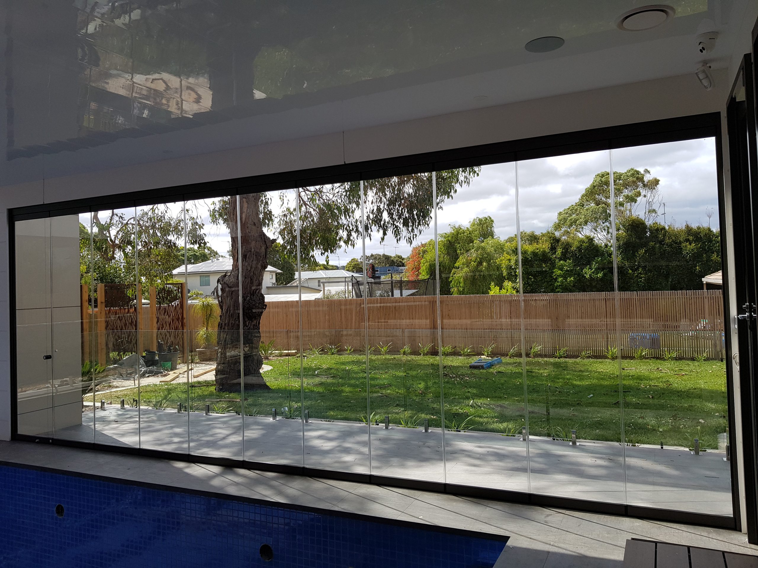 Glass pool enclosure